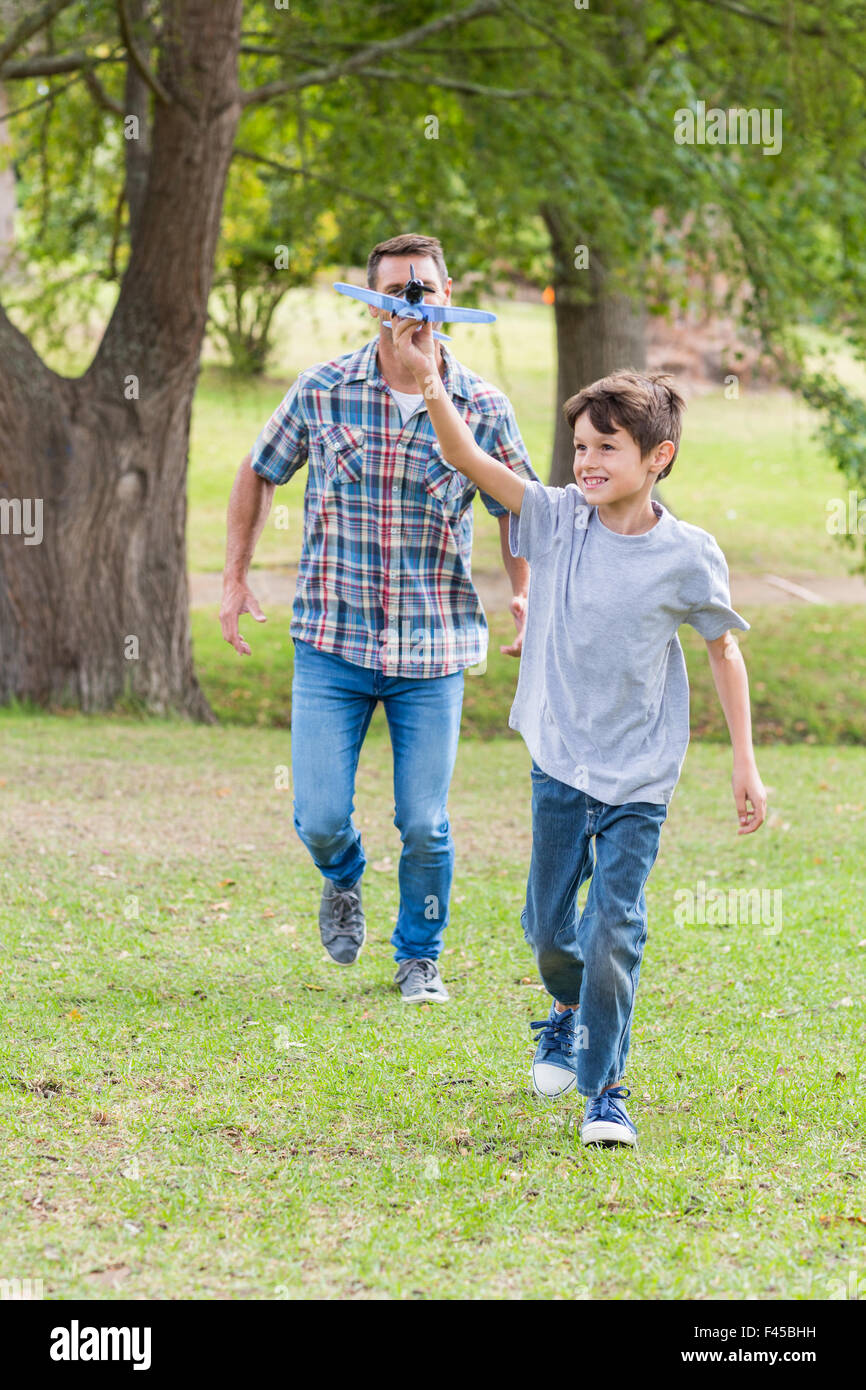 Father son park toy airplane hi-res stock photography and images - Alamy