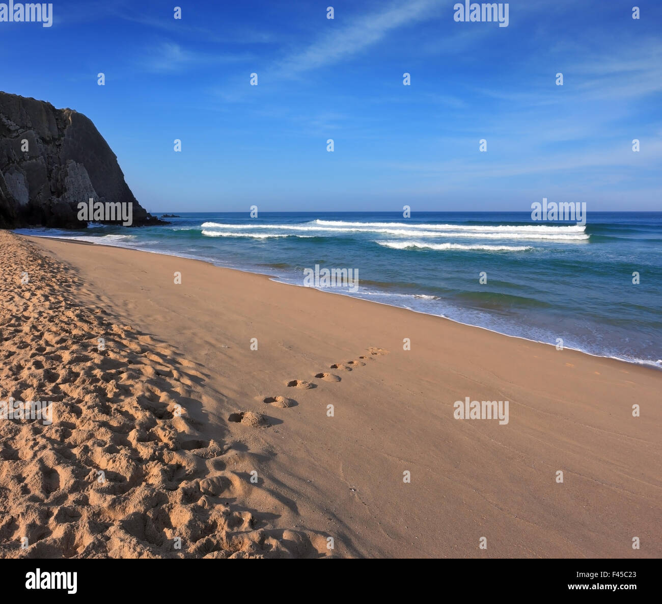 Early sun on the sandy beach Stock Photo