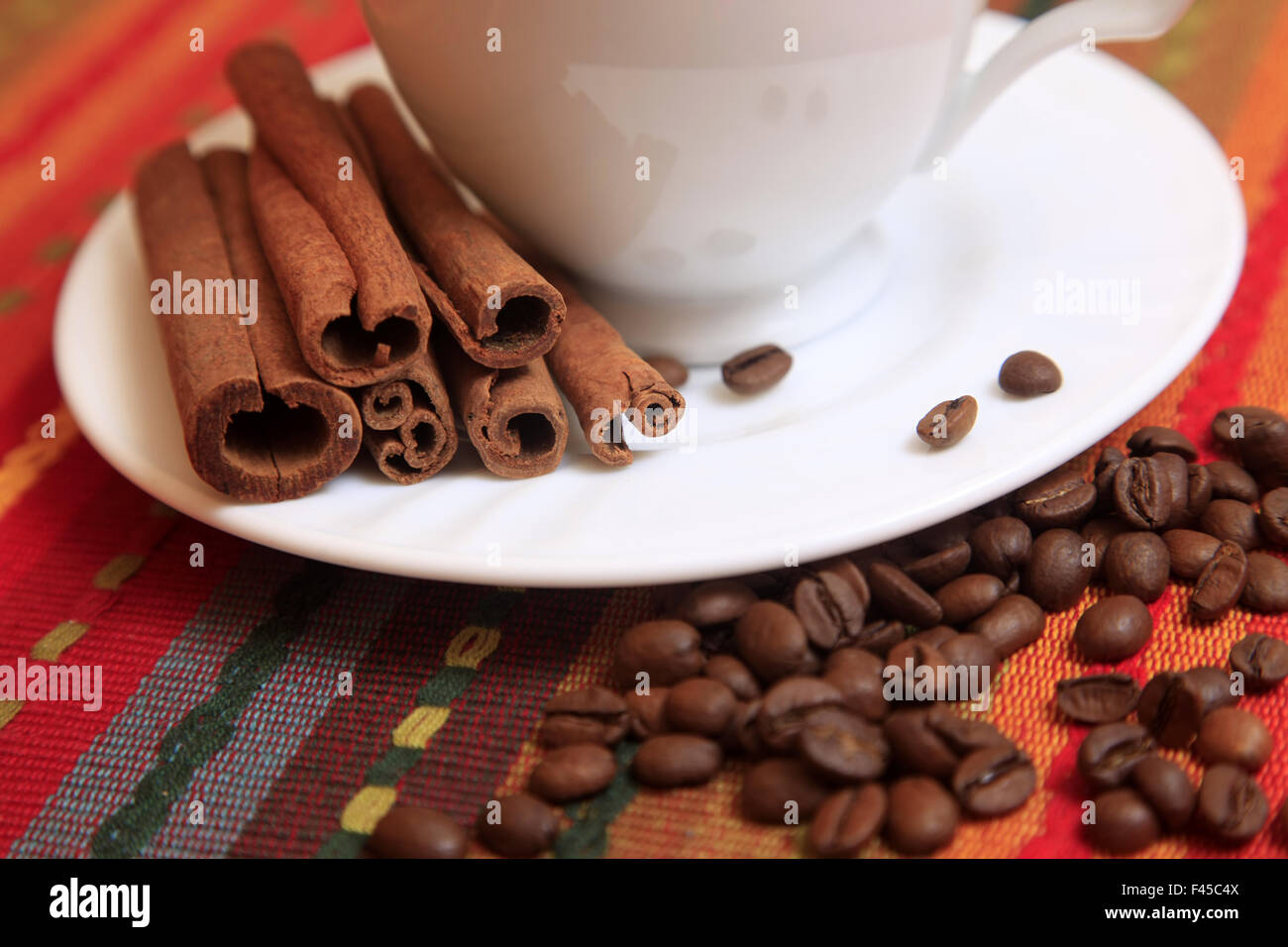 Cinnamon sticks with coffee Stock Photo Alamy