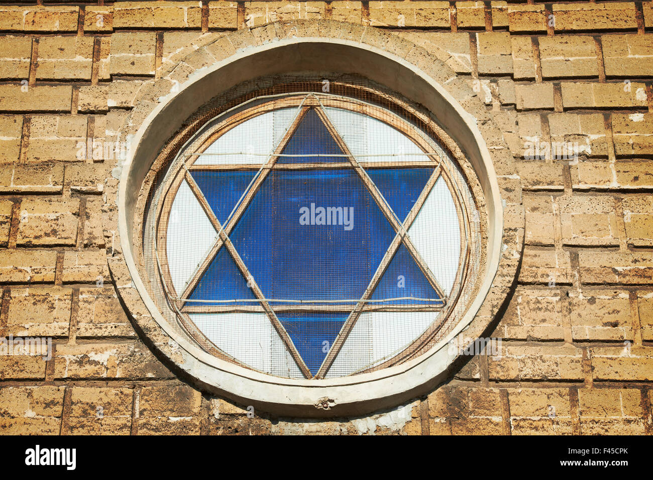 Blue star of David in the window Stock Photo