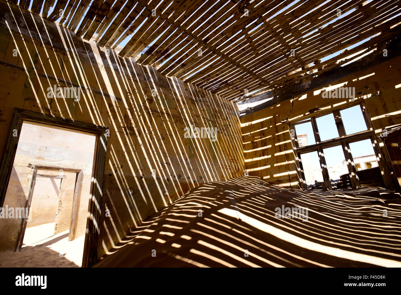 Shadows Of Rafter On Sand In Abandoned House Kolmanskop Ghost