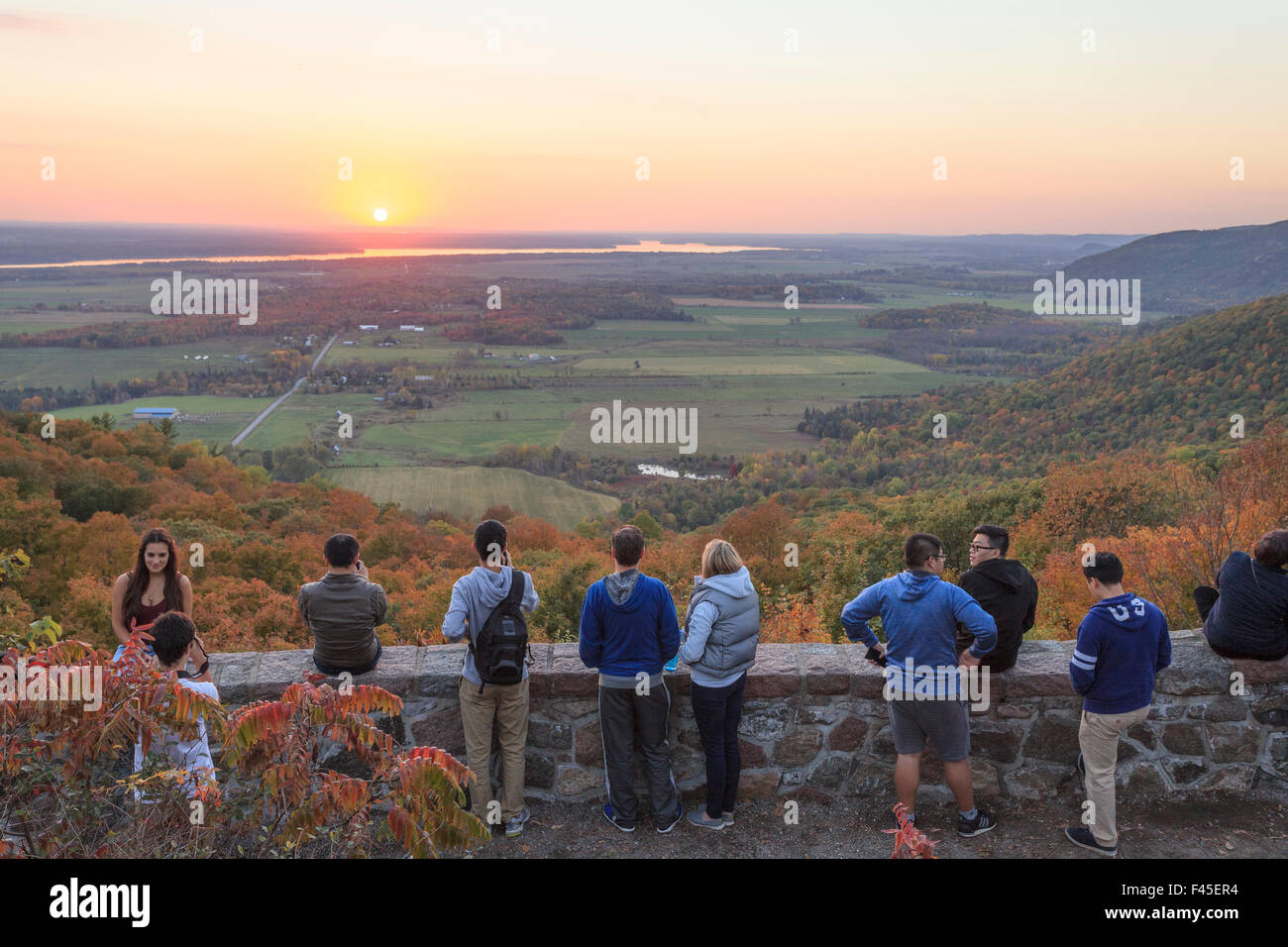 Watching sunset at the Champlain Lookout in the fall in the Gatineau Park Stock Photo