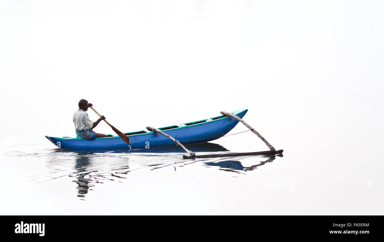 Traditional dugout canoe isolated in white background, Sri Lanka Stock