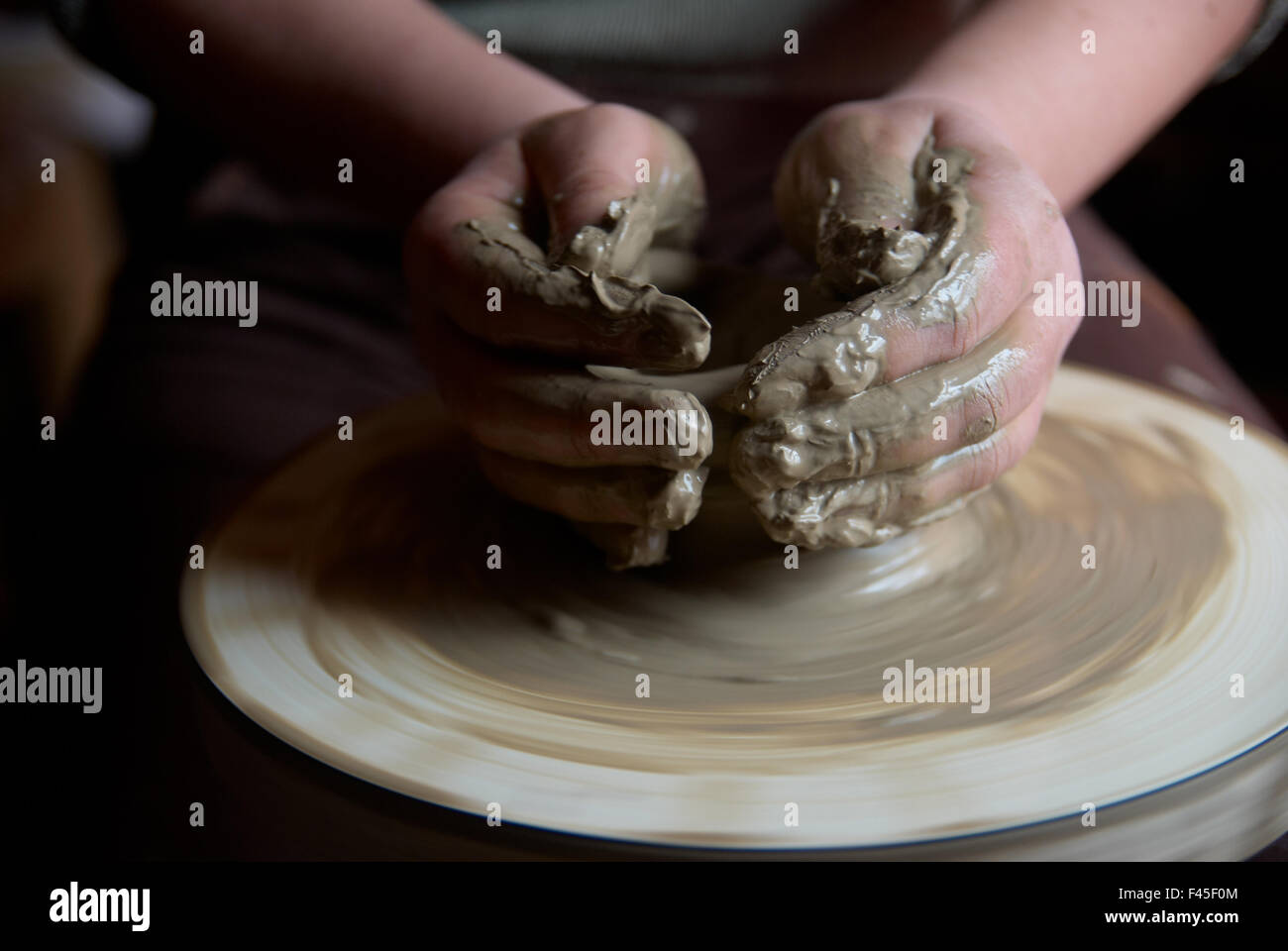 Hands forming clay pot Stock Photo Alamy