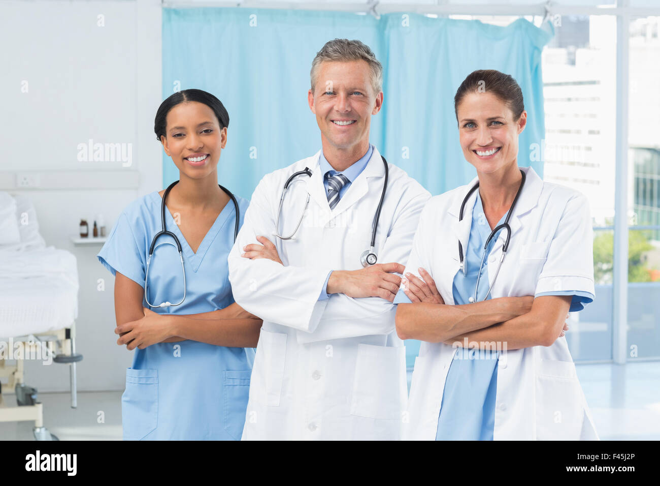 Confident male and female doctors Stock Photo