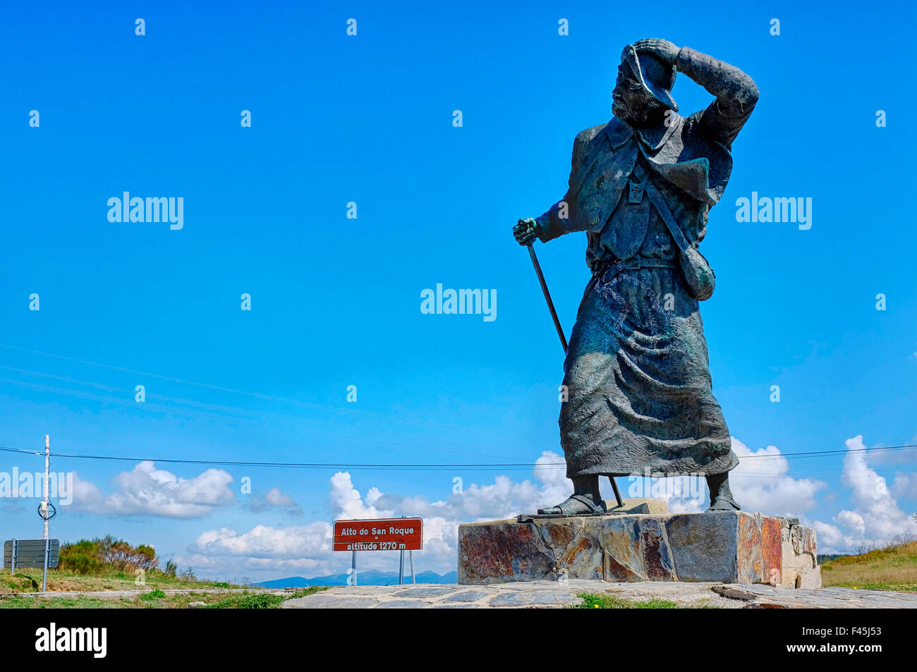 Bronze statue of a pilgrim on the Alto de San Roque on the Way of Saint James (Camino de Santiago), Galicia, Spain Stock Photo