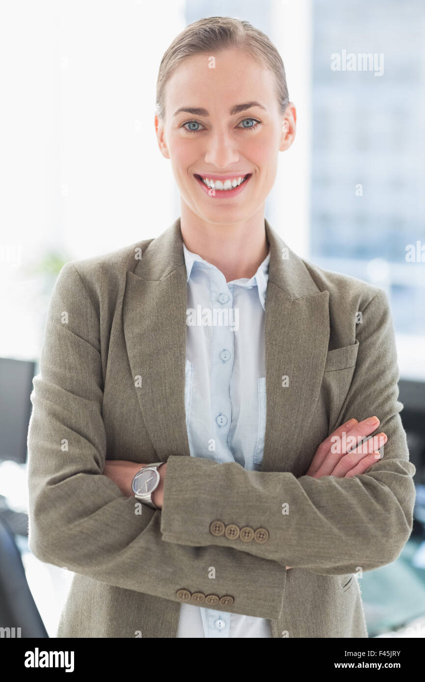 Beautiful businesswoman with arms crossed Stock Photo - Alamy