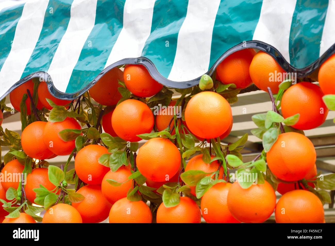 Plastic oranges with awning Stock Photo Alamy
