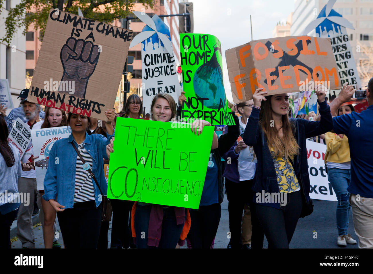 Washington, DC USA. 14th October, 2015:  Hundreds of climate activists gathered in Washington, DC to take part in the National day of action on climate, called the People's Climate March.  Activists gathered in Franklin Square and marched to the American Petroleum Institute on K St., where activists staged street theater and chanted climate and democracy slogans. Credit:  B Christopher/Alamy Live News Stock Photo