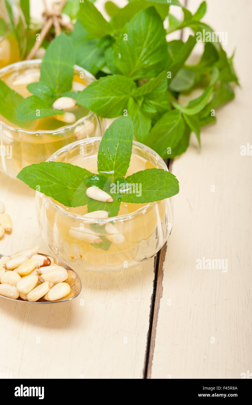 Arab traditional mint and pine nuts tea Stock Photo Alamy