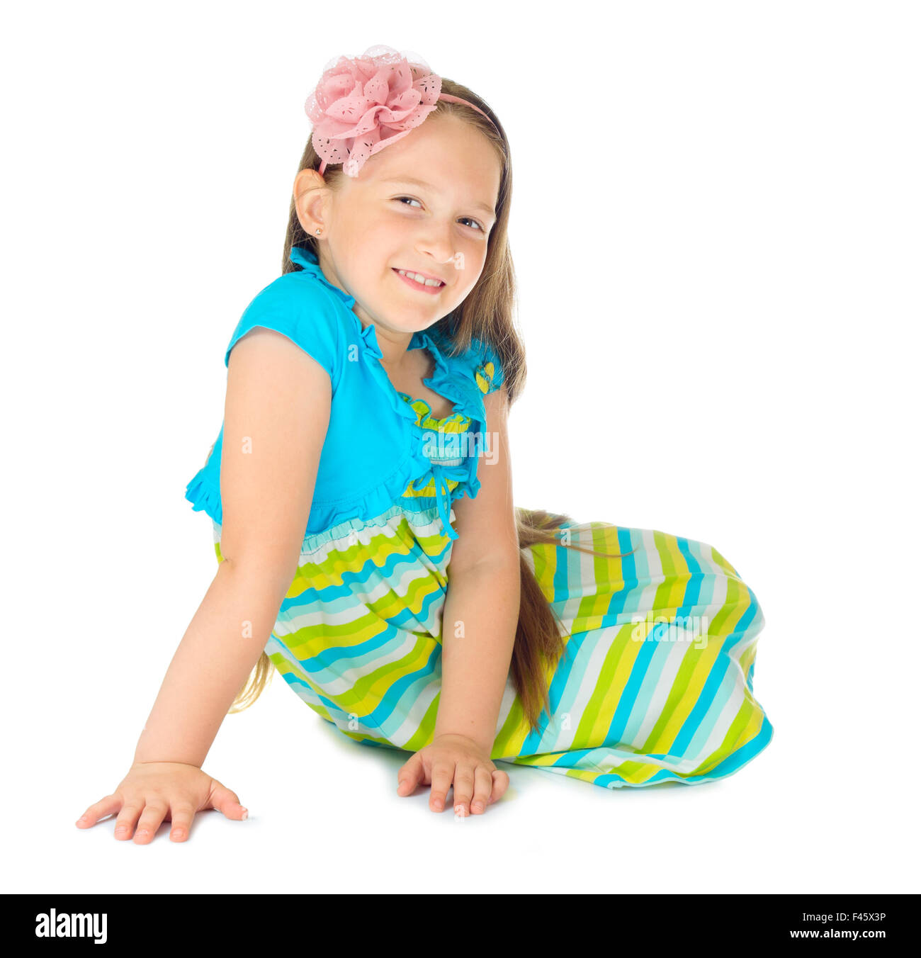 Little girl in blue dress isolated Stock Photo - Alamy