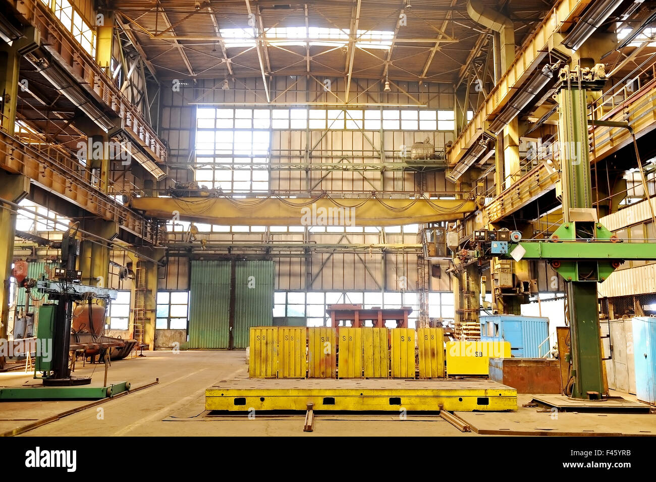 Industrial shot with the interior of an old heavy duty factory Stock Photo