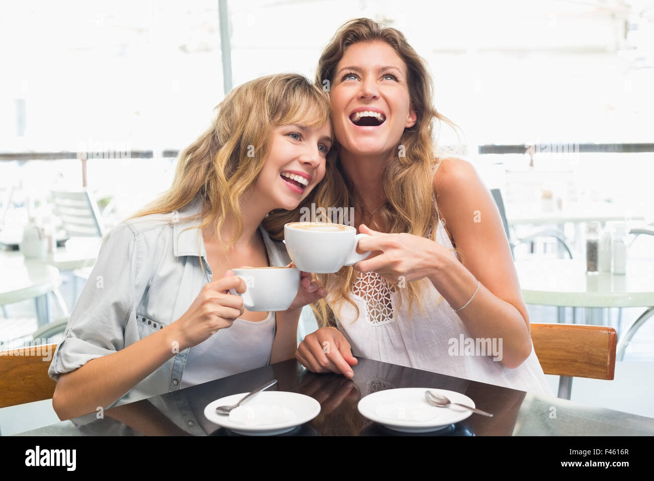 Women laughing hi-res stock photography and images - Alamy