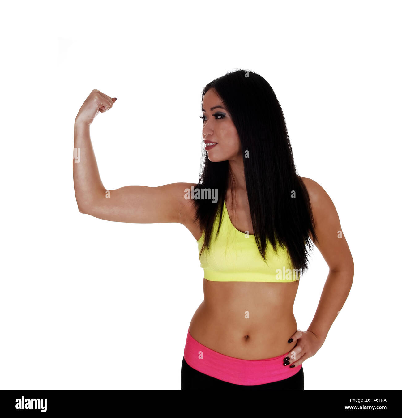 Girl showing her biceps. Stock Photo