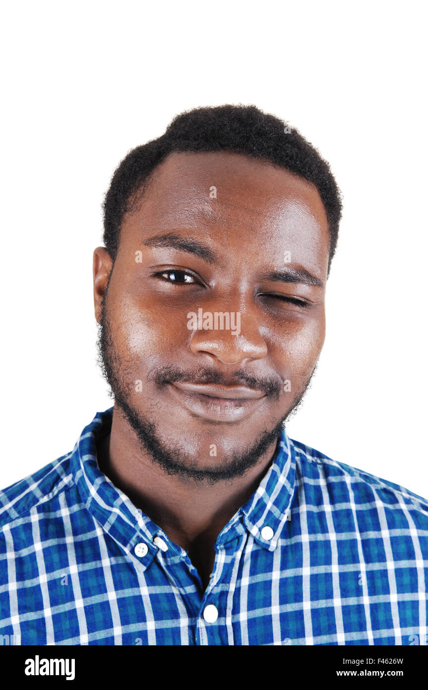 Black man blinking with his eye Stock Photo Alamy