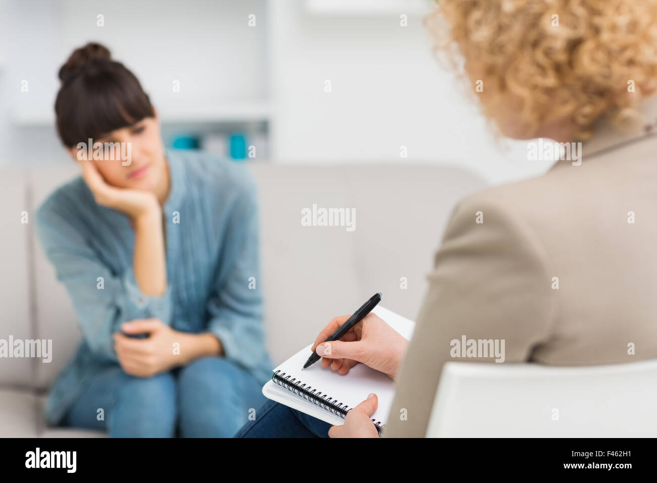 Psychologist talking with her depressed patient Stock Photo Alamy