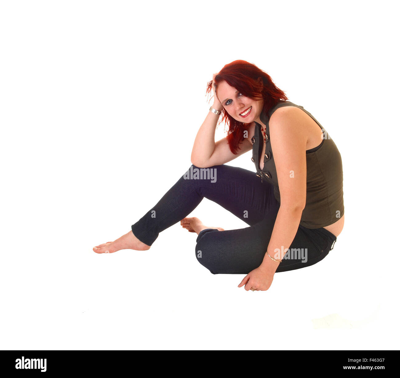Girl sitting on floor. Stock Photo