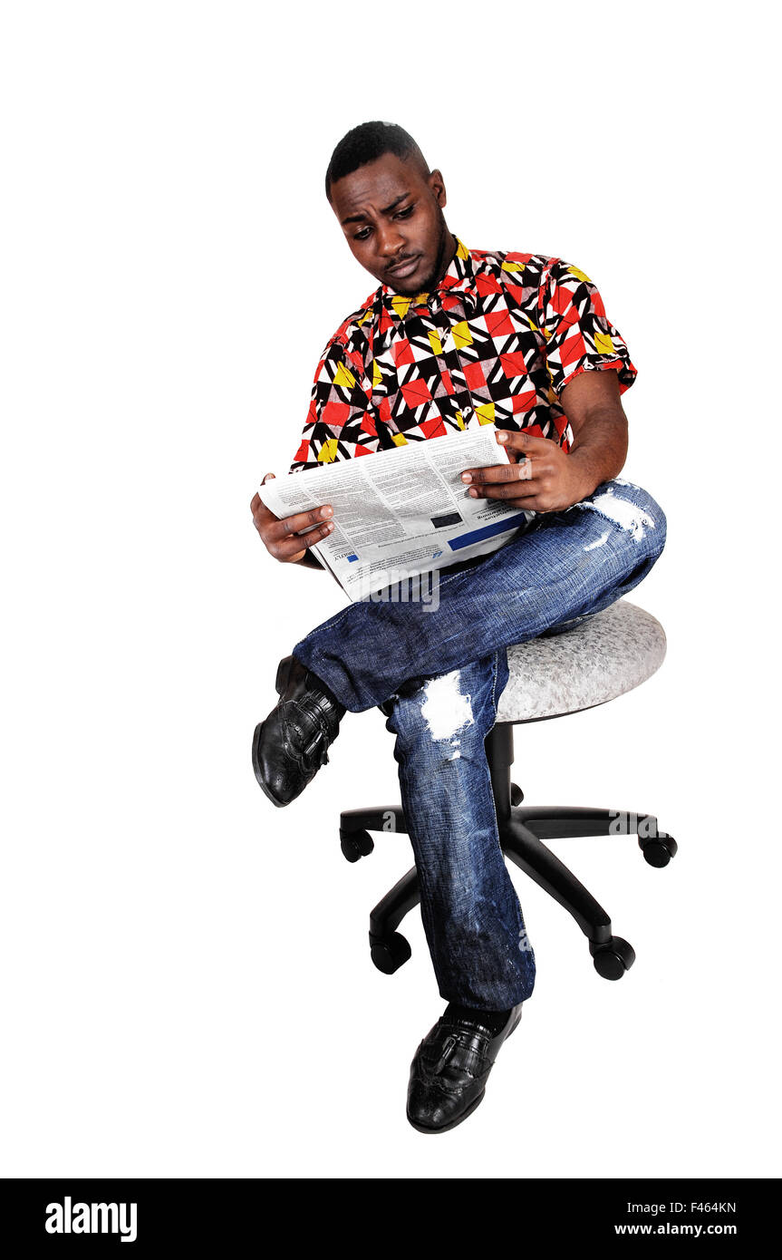 Black man reading paper. Stock Photo