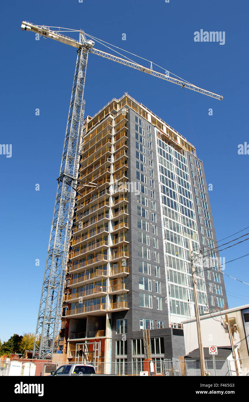 Scaffolding high rise building new construction hi-res stock ...