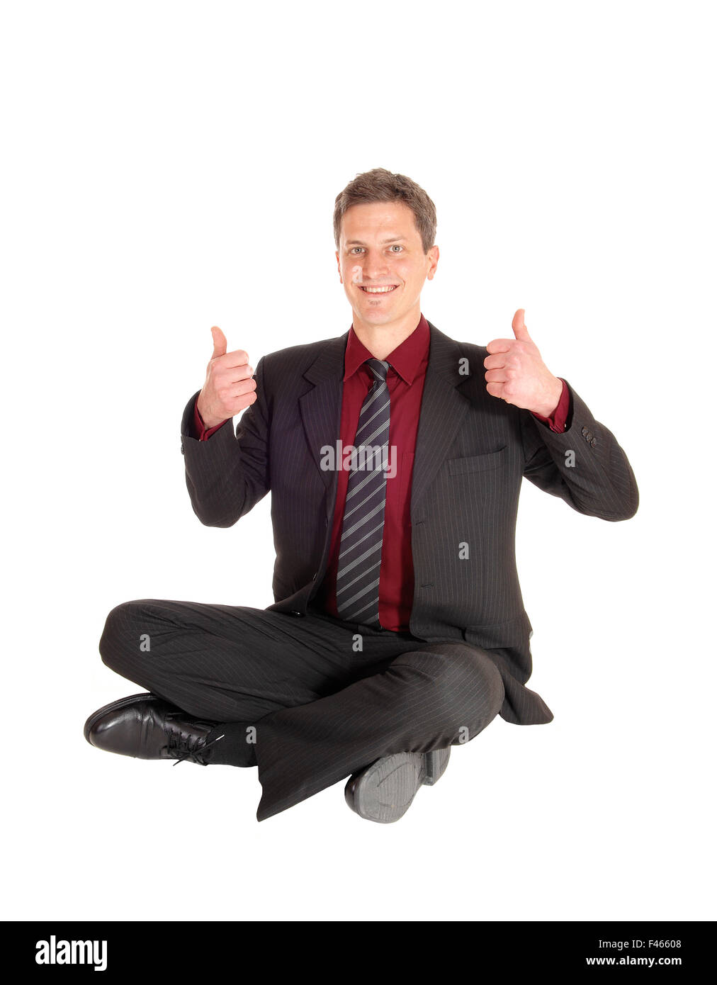 Businessman with thumb up. Stock Photo
