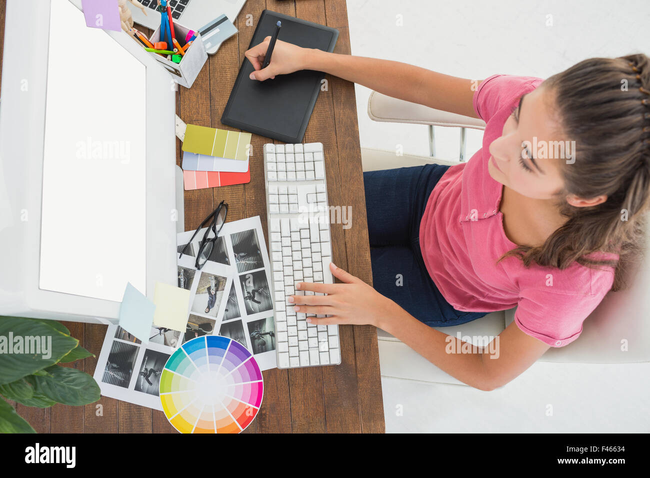 Creative businesswoman using graphic tablet Stock Photo