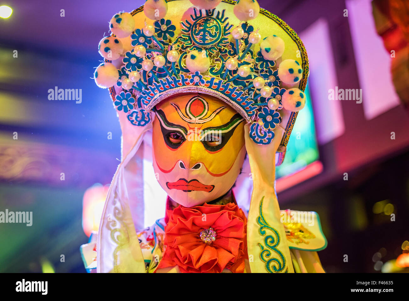 Chengdu, Sichuan Province, China - October 8, 2015: Chinese artist perform traditional face-changing onstage. Stock Photo