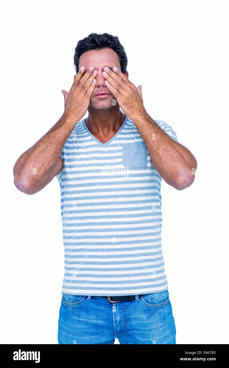Man covering his eyes Stock Photo Alamy