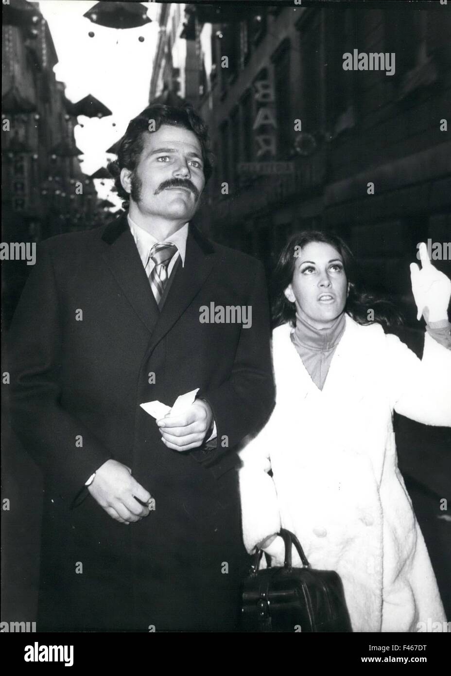 Patrick Wanyne, son of John Wayne, and also he know actor, is in Rome for a short visit. There is accompanied by a beautiful, but unidentified woman, walking via via Frattina. 24th Feb, 1968. © Keystone Pictures USA/ZUMAPRESS.com/Alamy Live News Stock Photo