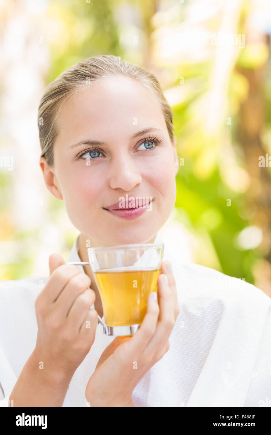 Attractive woman drinking tea Stock Photo Alamy