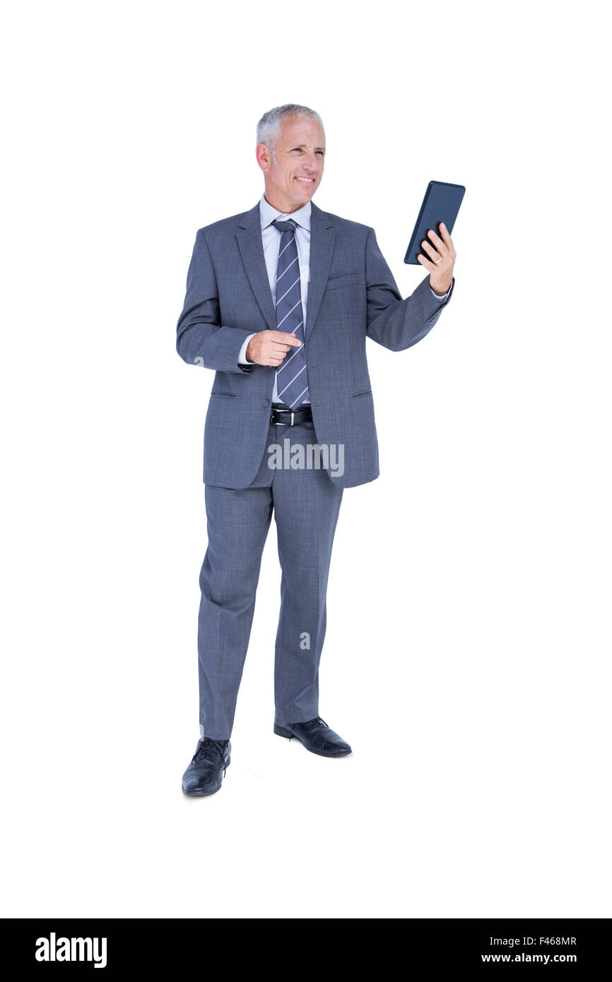 Businessman looking at tablet computer Stock Photo