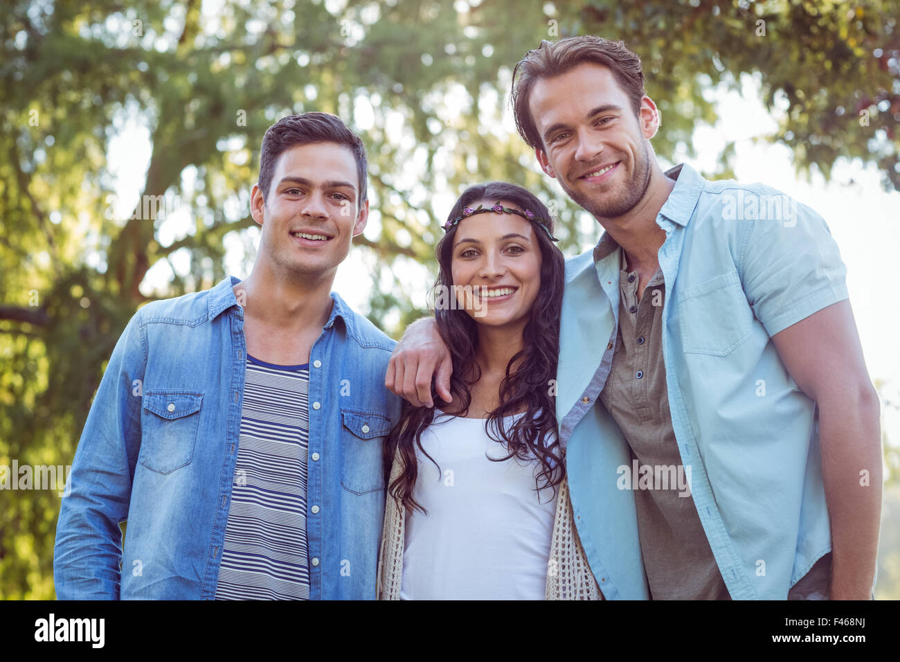 Happy friends in the park Stock Photo - Alamy