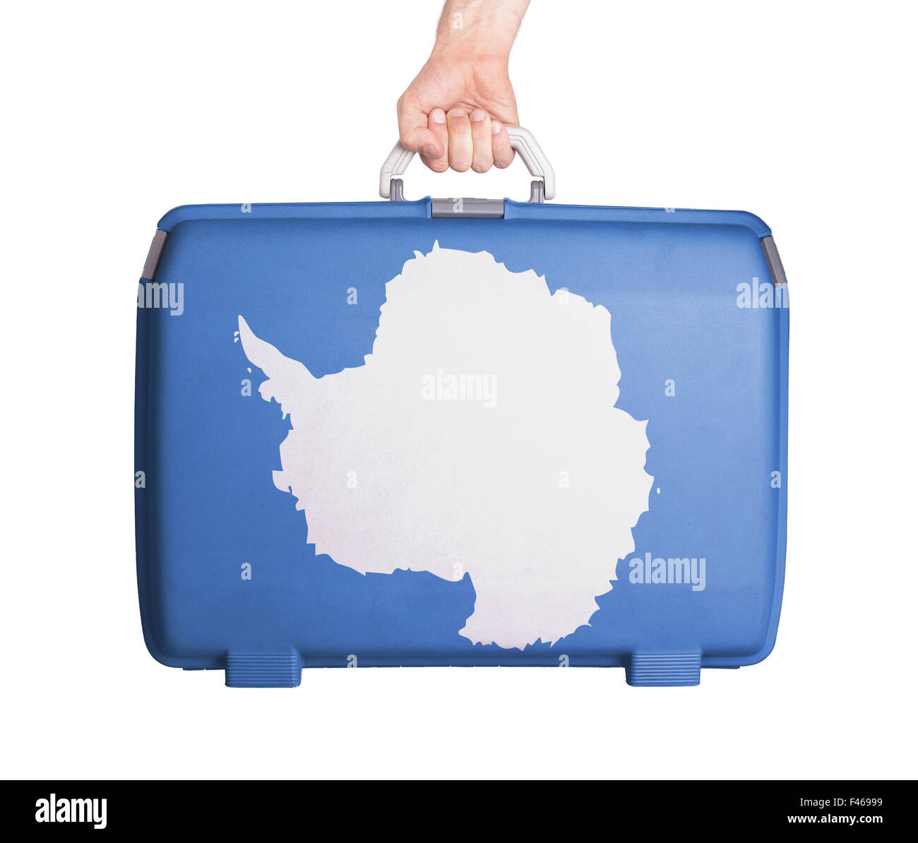 Used plastic suitcase with stains and scratches, printed with flag - Antarctica Stock Photo