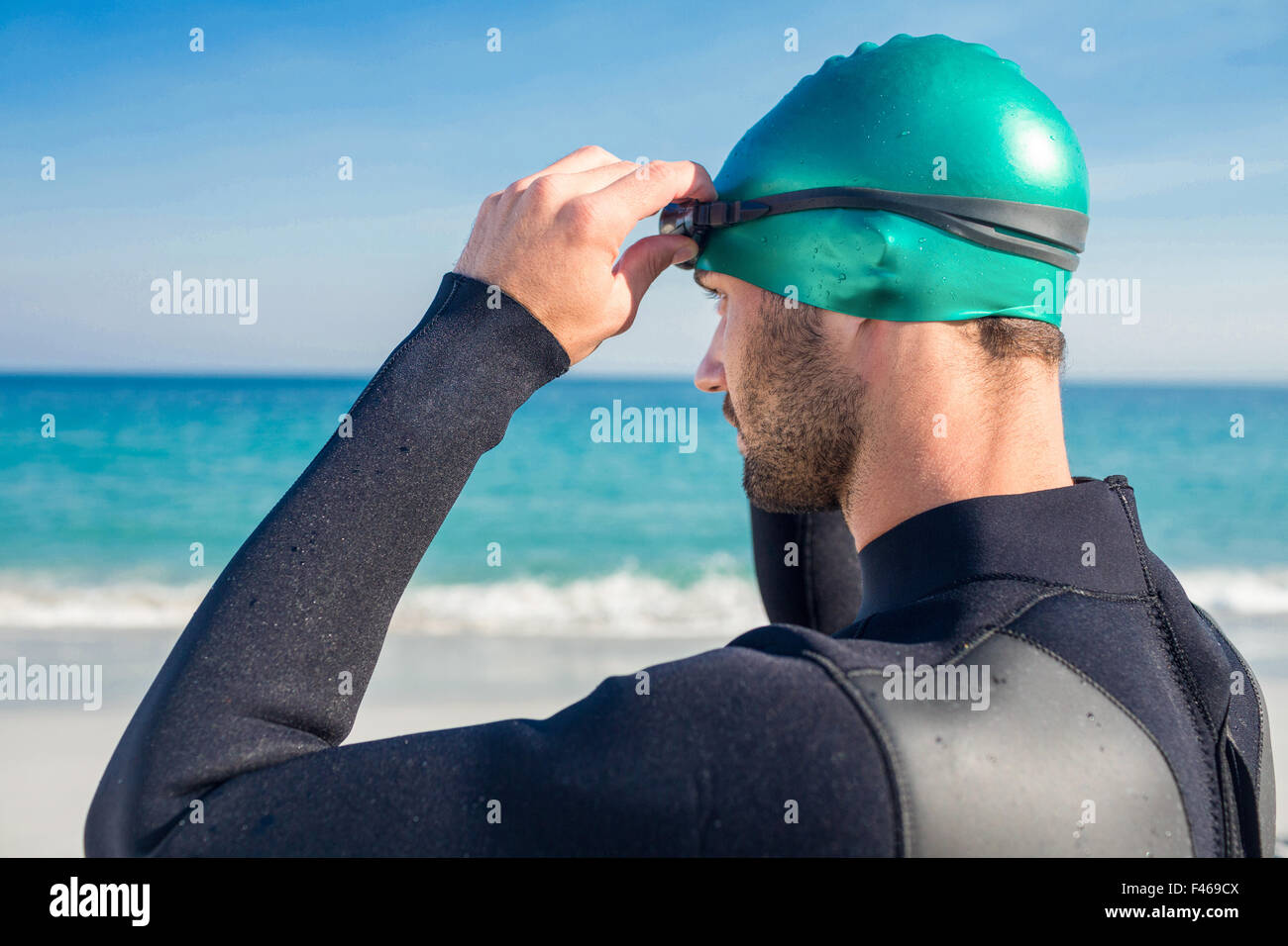 Swimmer Getting Ready Swimmer getting ready at the beach Stock Photo - Alamy