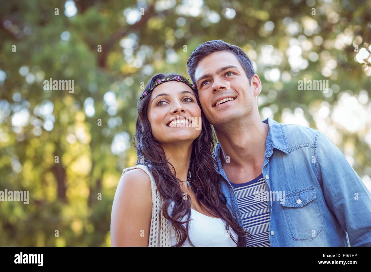 Cute couple smiling in the park Stock Photo - Alamy