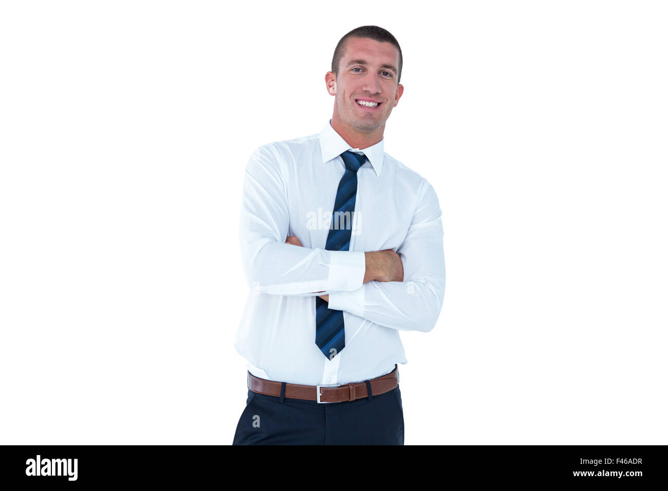 Smiling businessman with arms crossed Stock Photo - Alamy
