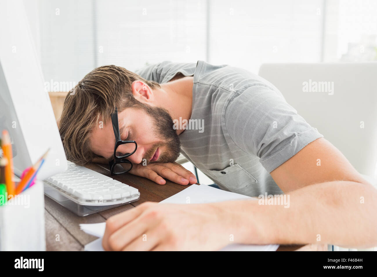 Sleeping at desk hi-res stock photography and images - Alamy