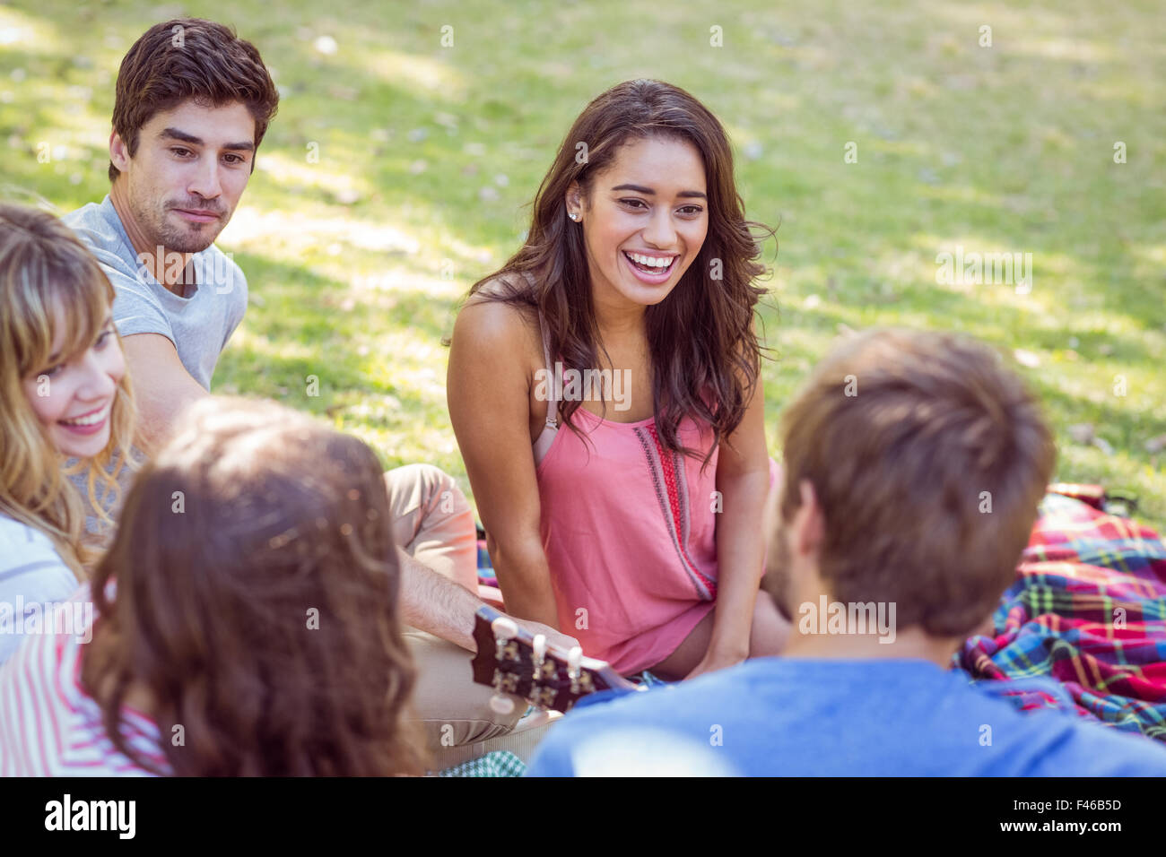 happy friends in a park Stock Photo - Alamy