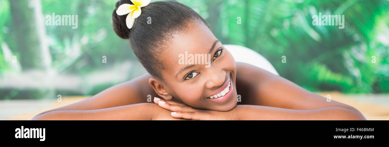 Pretty woman lying on massage table Stock Photo - Alamy