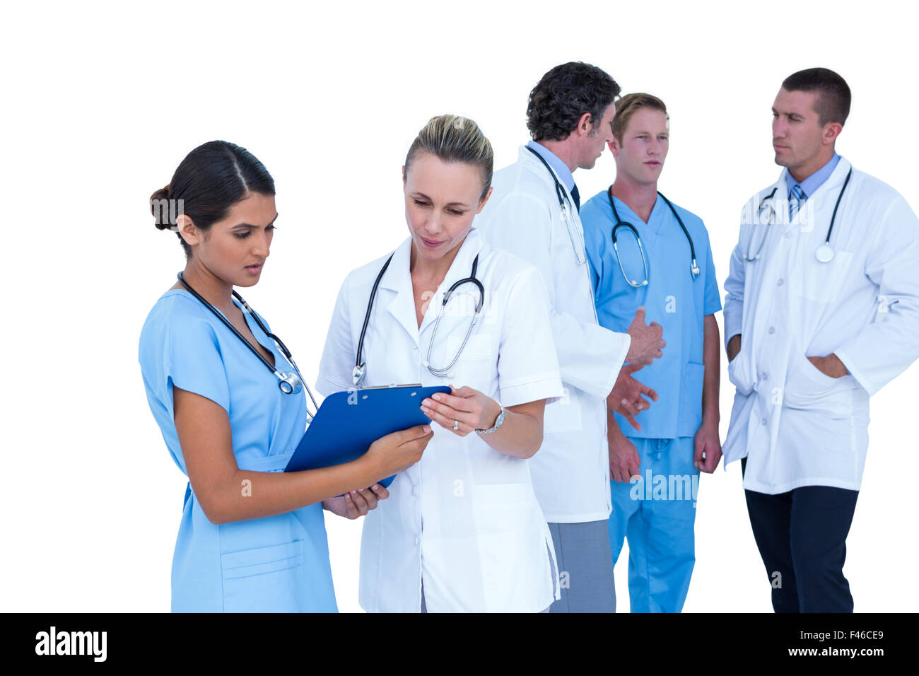 Doctor and nurse discussing over notes Stock Photo - Alamy