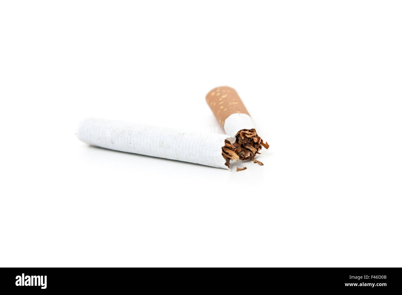 Cracked cigarette. All on white background Stock Photo