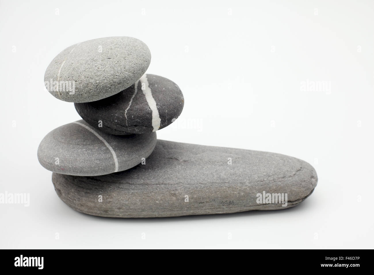 Stone balancing isolated on white background Stock Photo Alamy