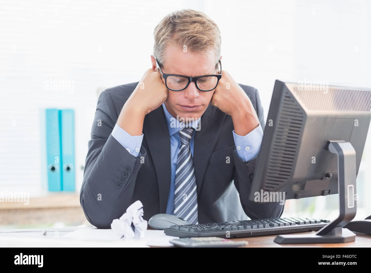 Businessman being depressed by accounting Stock Photo Alamy