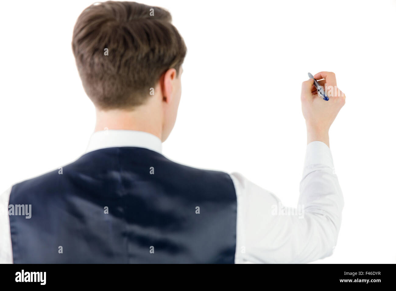 Businessman writing something with pen Stock Photo - Alamy