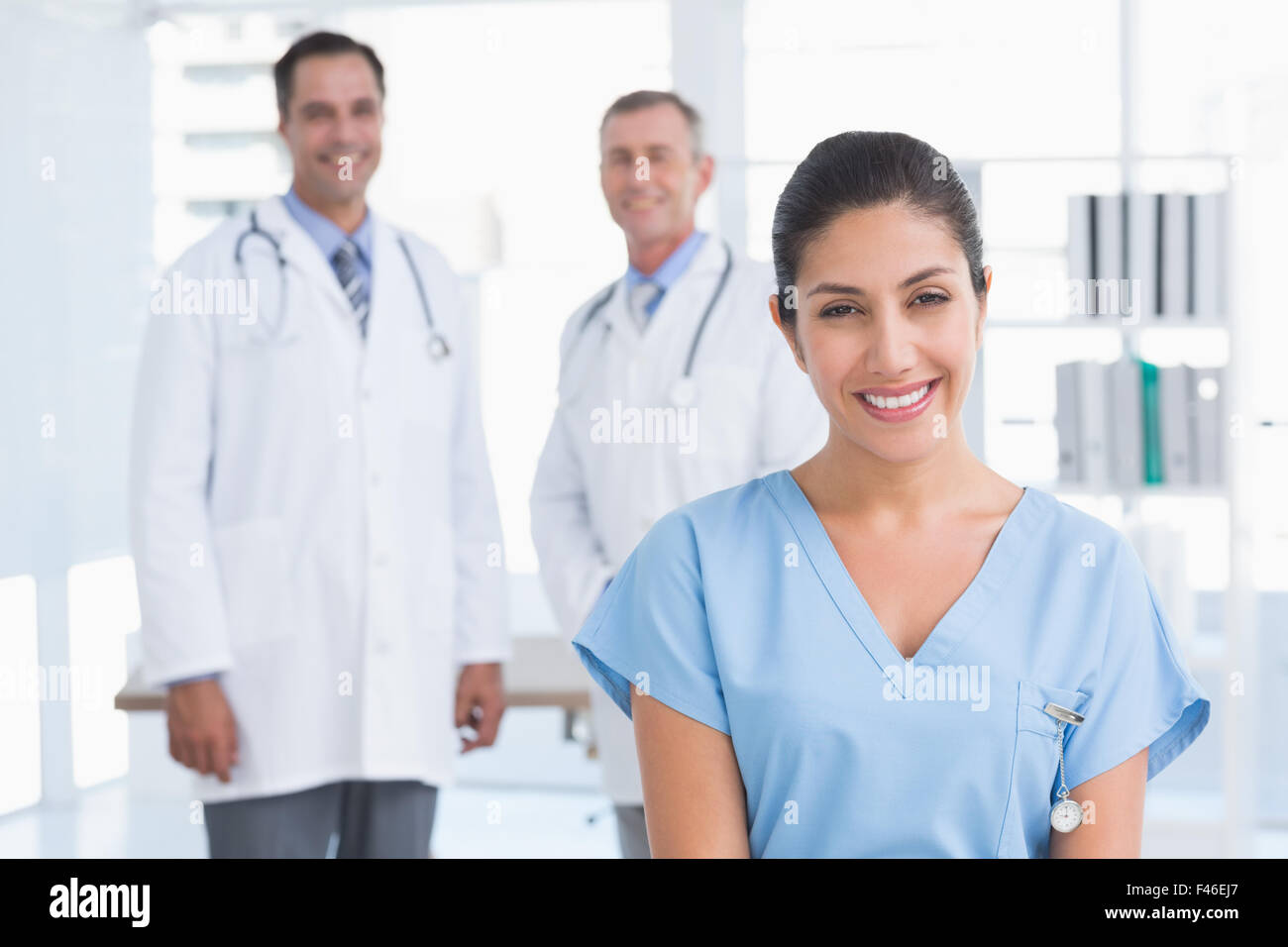 Speaking smiling nurse hi-res stock photography and images - Alamy