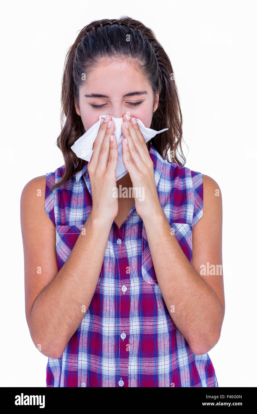 Pretty woman blowing her nose Stock Photo Alamy
