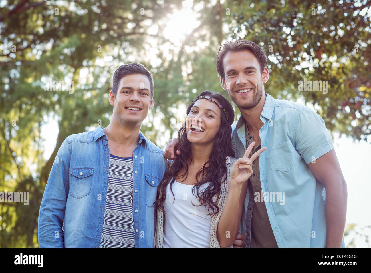 Happy friends in the park Stock Photo - Alamy