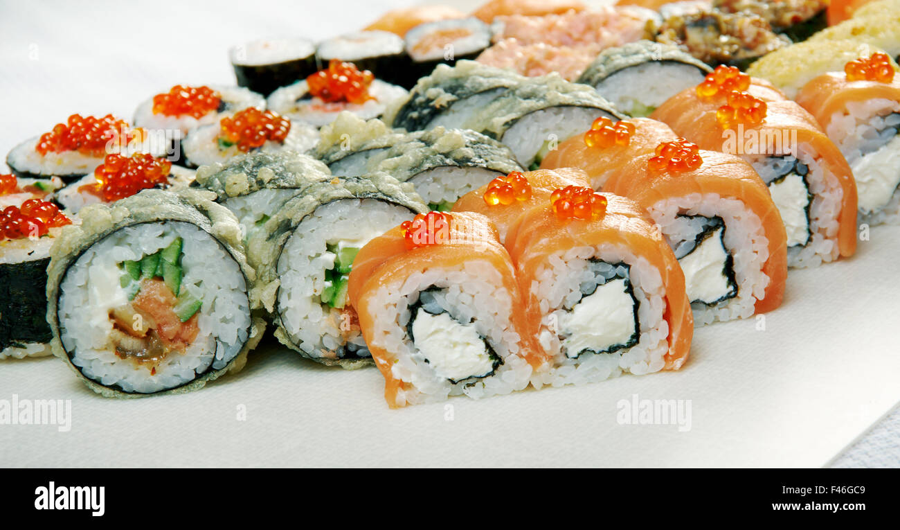 Food set of different Japanese Cuisine - Sushi Roll . Stock Photo