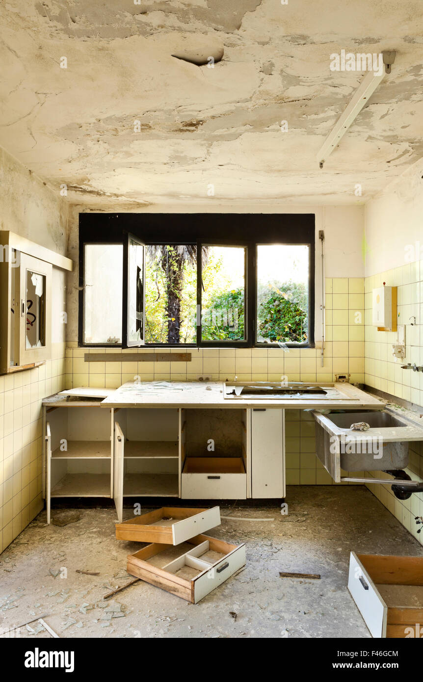 old kitchen destroyed, interior abandoned house Stock Photo