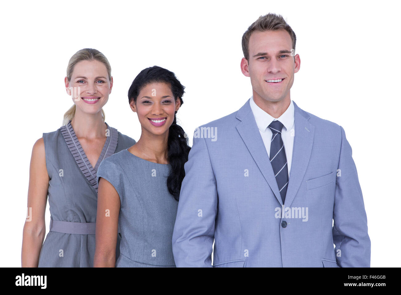 Happy business team smiling at camera Stock Photo - Alamy