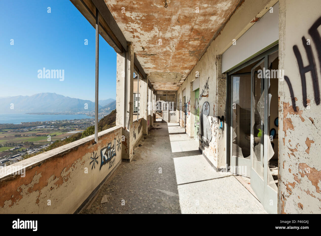 old destroyed building, corridor with windows Stock Photo
